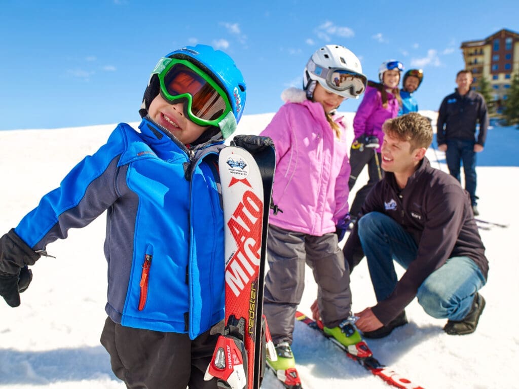 Final outdoor ski equipment final fitting with family and Black Tie Skis technician