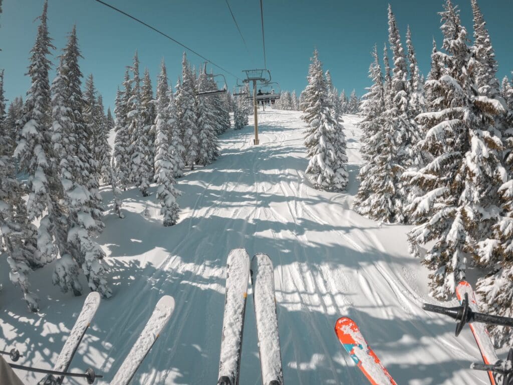 A scenic view of a white pass ski resort from a ski lift