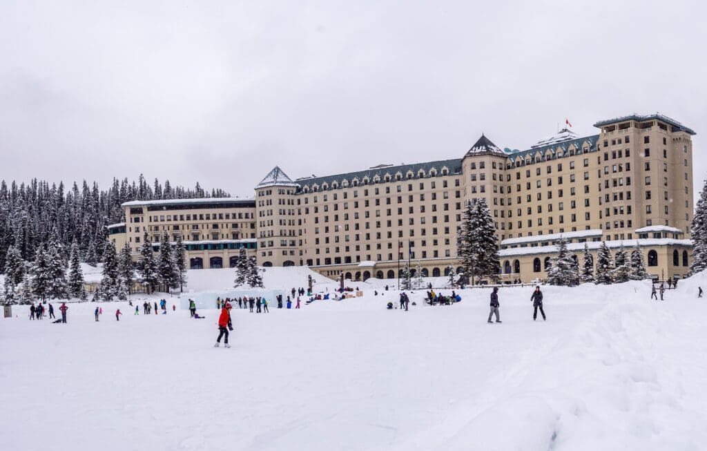 Visitors enjoy the ice skating on iconic Lake Louise.