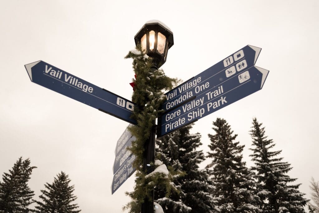 A street sign in Vail, Colorado during the winter.